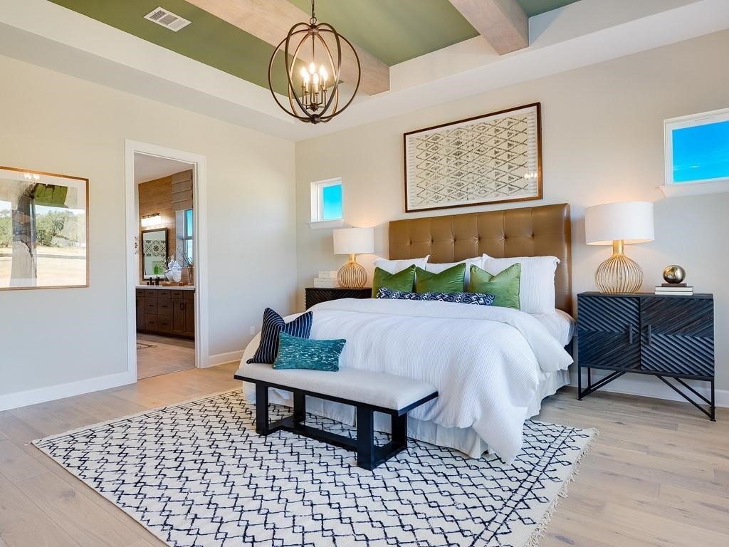 175 Call Drive Austin, TX 78737 - Photo 12 of 28 a bedroom with a bed and dresser