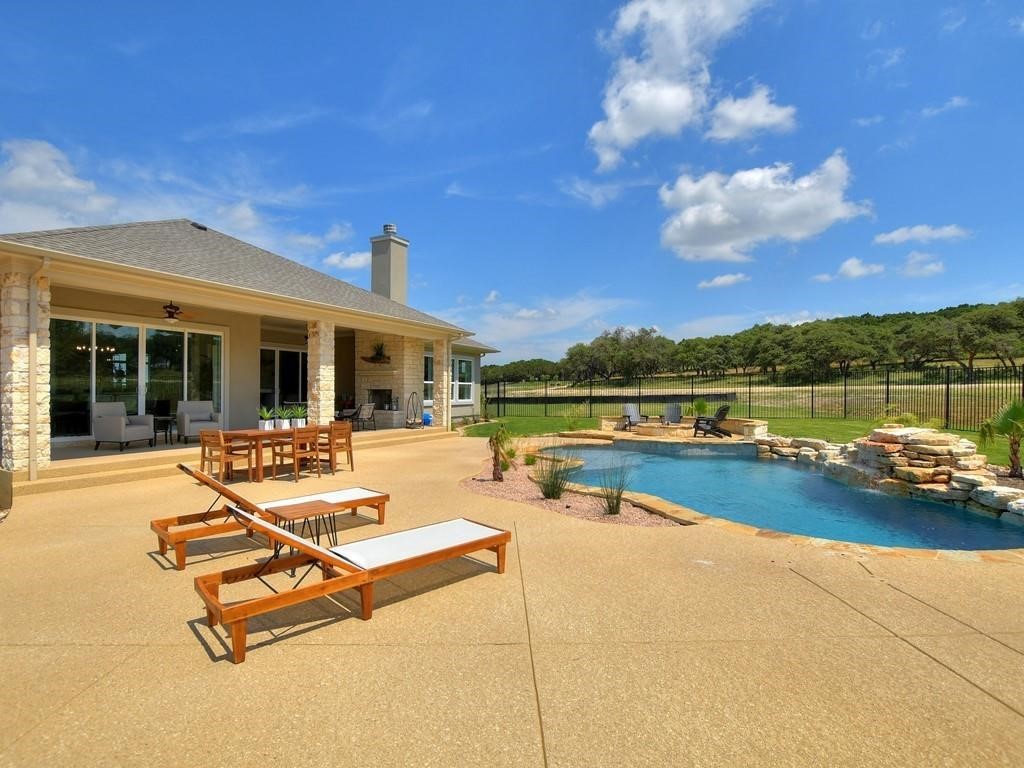 175 Call Drive Austin, TX 78737 - Photo 26 of 28 a view of swimming pool with seating area and barbeque oven