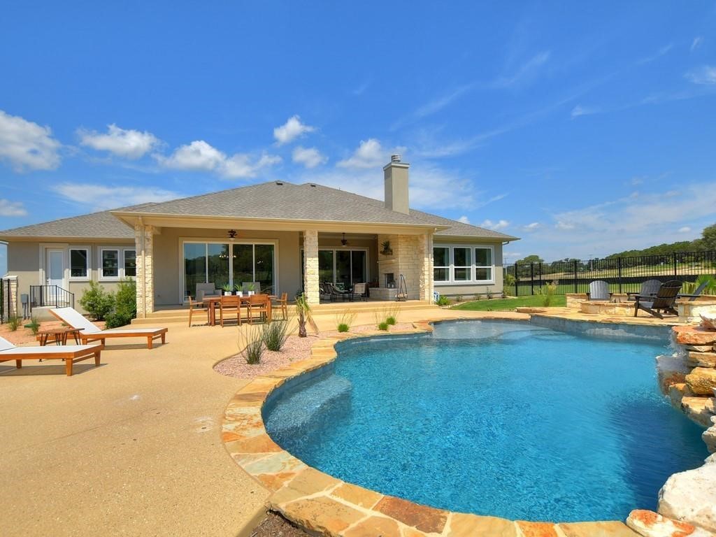 175 Call Drive Austin, TX 78737 - Photo 3 of 28 a view of a house with swimming pool and sitting area