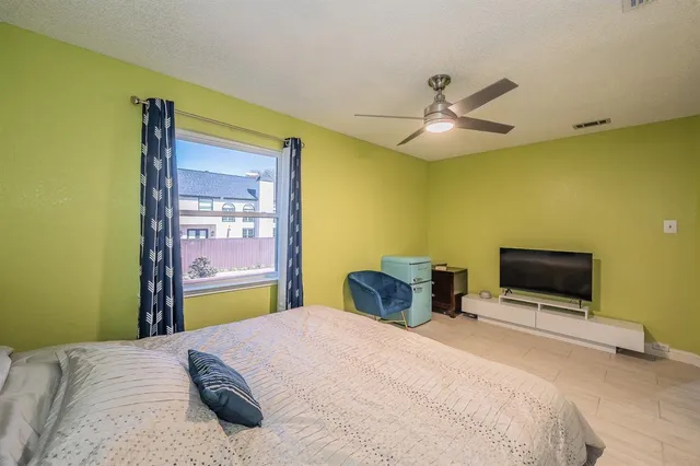 a bathroom with a double vanity sink mirror and toilet