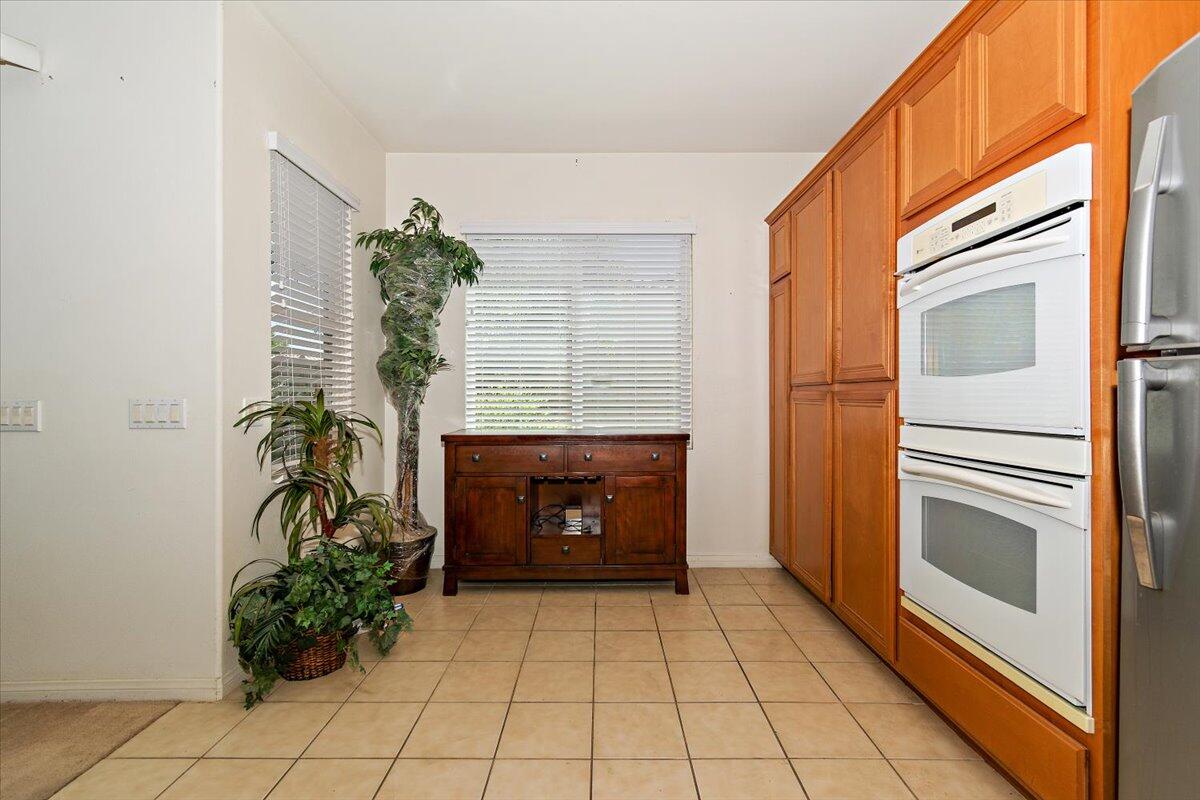 49528 Pacino Street Indio, CA 92201 - Photo 11 of 22 a bathroom with a sink and a mirror