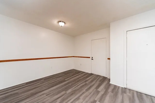 a view of small space with wooden floor