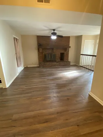 a view of a livingroom with a furniture
