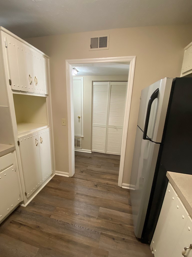 6213 Olde Towne Drive, Unit B Columbus, GA 31907 - Photo 5 of 7 a view of hallway with wooden floor