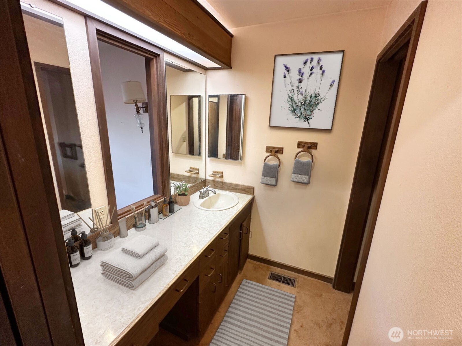 1303 Nightingale Road Wapato, WA 98951 - Photo 24 of 32 a bathroom with sink double vanity and a mirror