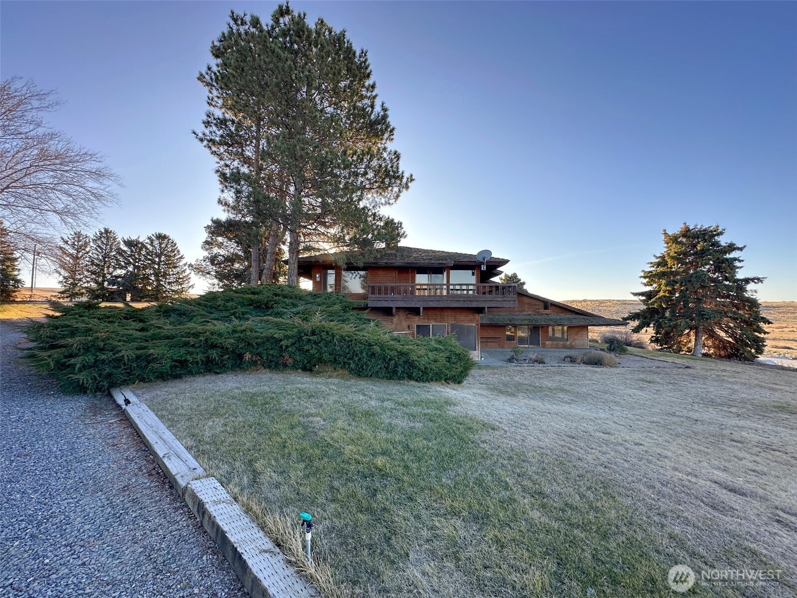 1303 Nightingale Road Wapato, WA 98951 - Photo 5 of 32 a view of a house with a yard