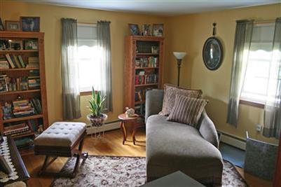 157 Poponessett Road Cotuit, MA 02635 - Photo 14 of 25 a living room with furniture and a window