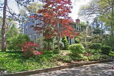 157 Poponessett Road Cotuit, MA 02635 - Photo 18 of 25 a view of a garden with flowers