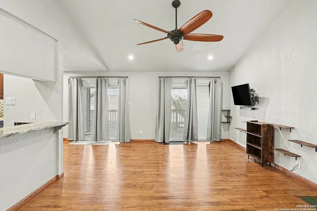 a view of a livingroom with a flat screen tv