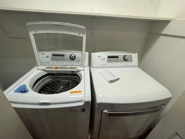a utility room with dryer and washer