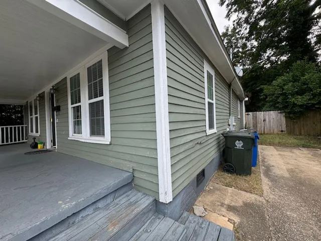 a view of a two chairs in the balcony