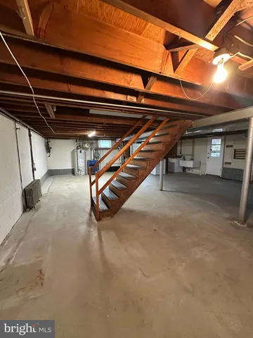 a view of empty room with wooden ceiling