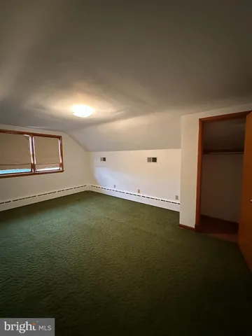 a view of a big room with wooden floor