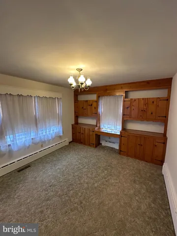 a front view of a house with yard