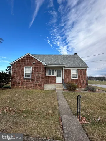 a large kitchen with a stove a sink dishwasher and a stove