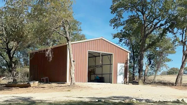 a view of garage with snow