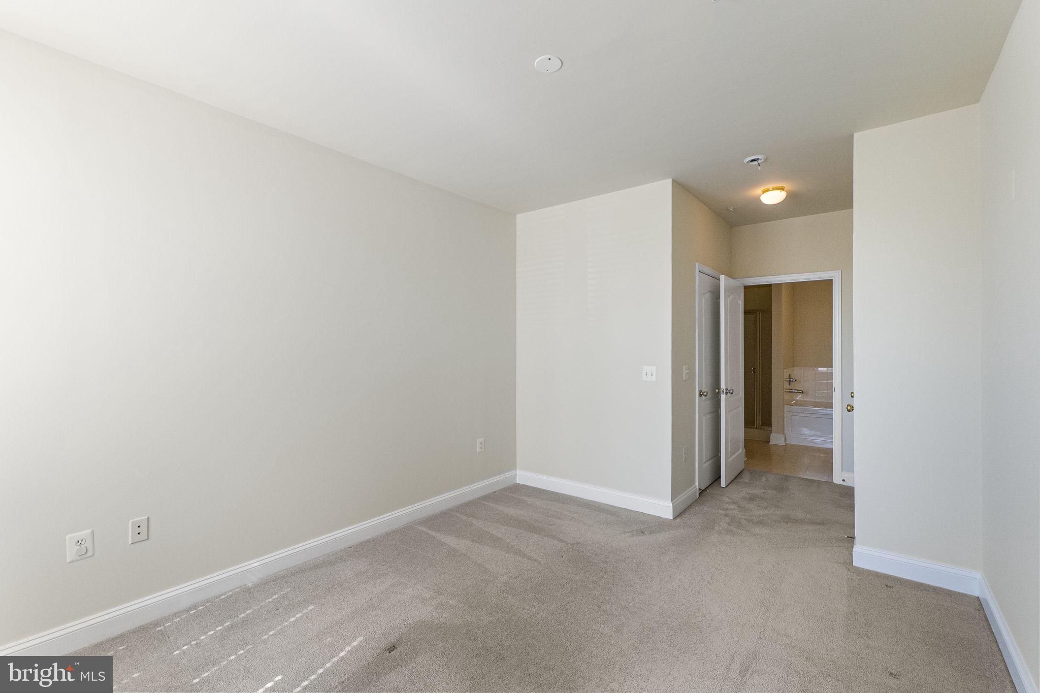 12824 Clarksburg Square Road, Unit 204 Clarksburg, MD 20871 - Photo 20 of 45 Primary bedroom