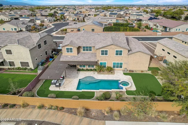 a patio with table and chairs