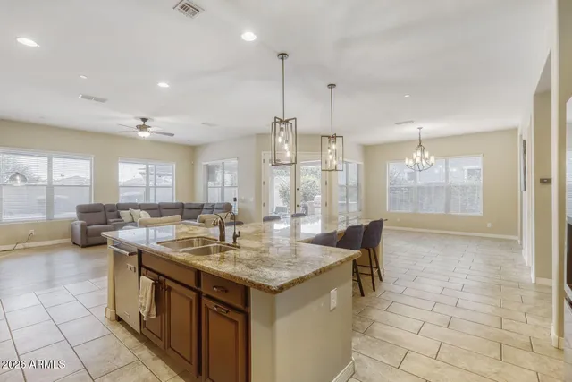a view of a swimming pool with a lounge chairs
