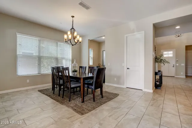 a view of a house with swimming pool and yard with green space