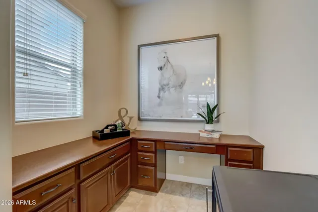 a view of a swimming pool with an outdoor seating