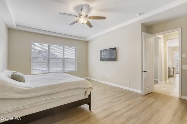 a room with furniture pool table and windows