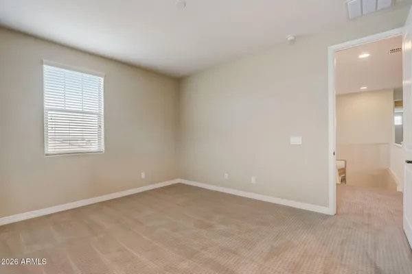 a view of outdoor space with table and chairs
