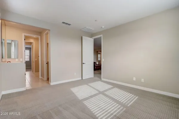 a view of a swimming pool with furniture