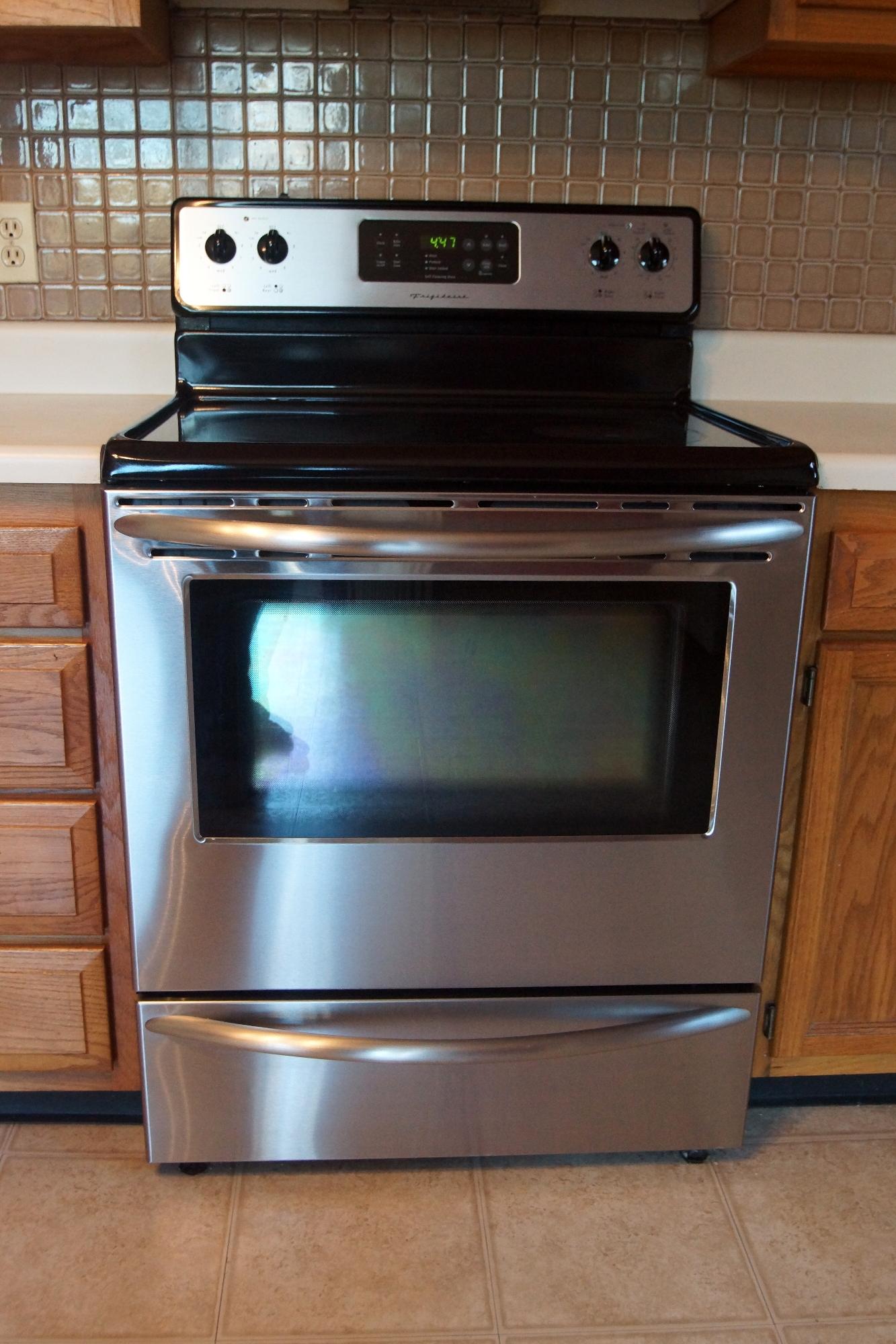 2411 Chimney Ridge Road Knoxville, TN 37923 - Photo 4 of 15 Stainless Steel stove - nice back-splash
