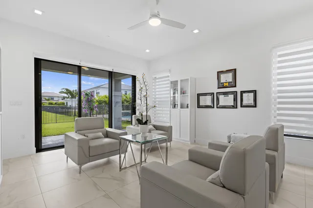 a living room with a couch and a window