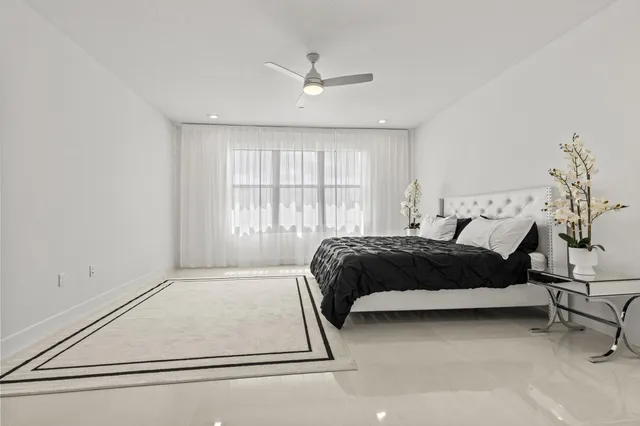 a bathroom with a bathtub and a sink