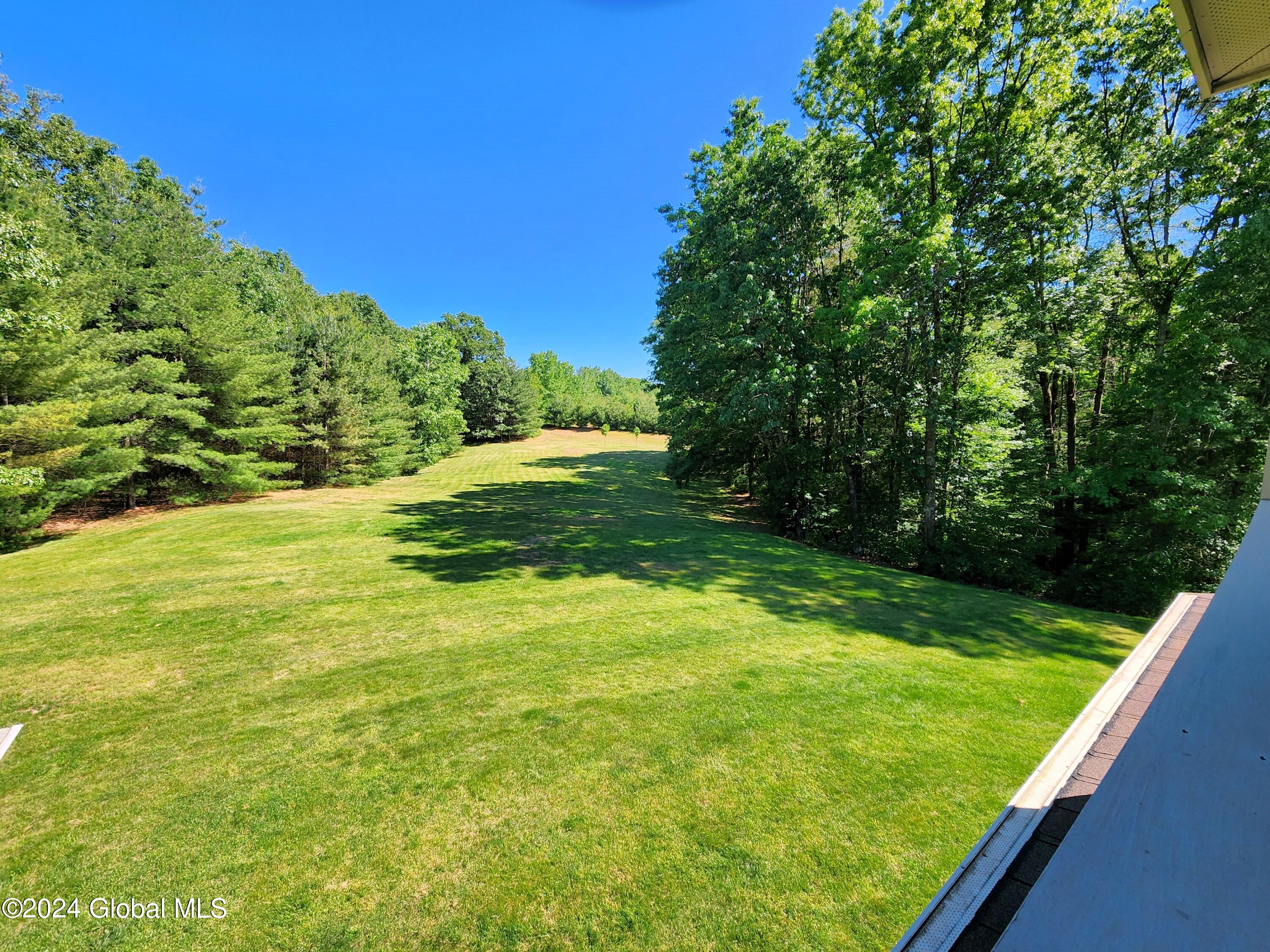9 Kendrick Hill Road Wilton, NY 12866 - Photo 15 of 50 lawn golf hole frm balcony20240603_15423
