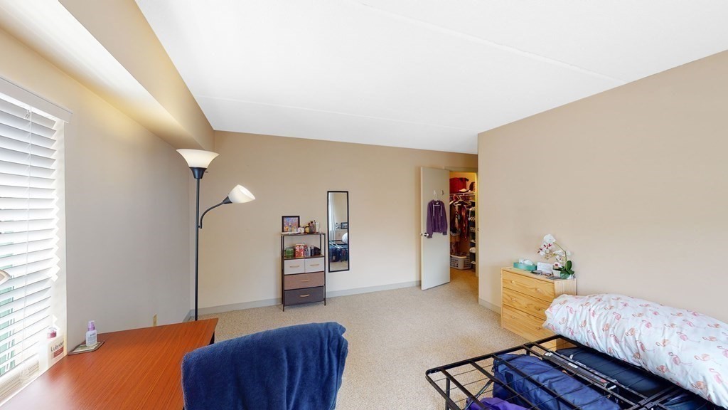 108 Peterborough Street, Unit 3E Boston, MA 02215 - Photo 5 of 11 a living room with furniture and wooden floor