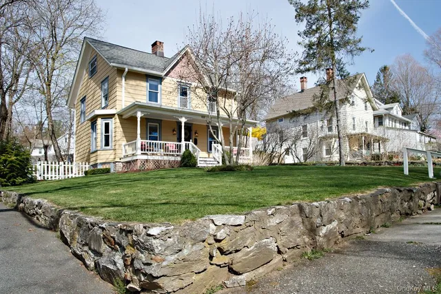 a view of an outdoor sitting area with furniture