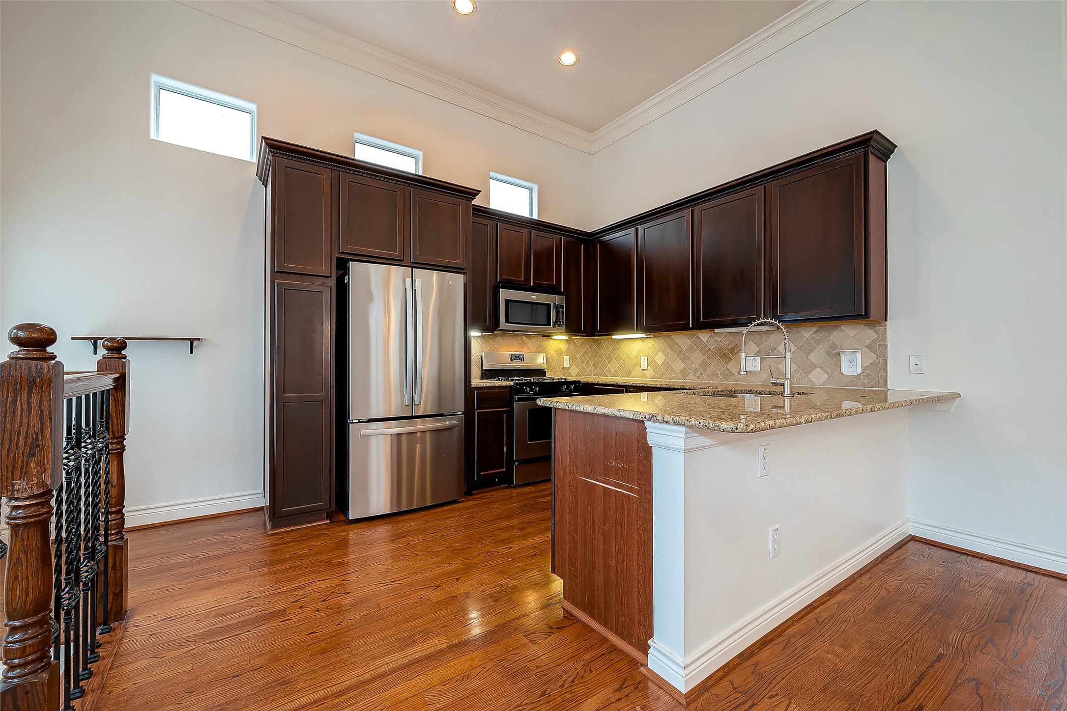 5608 Kansas Street, Unit B Houston, TX 77007 - Photo 6 of 24 Kitchen view with stainless steel appliances.