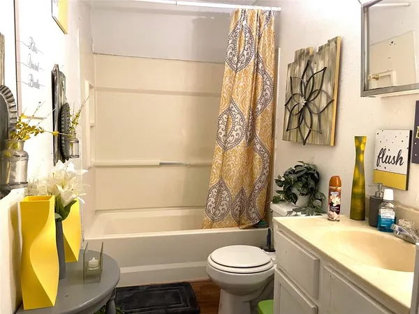 a bathroom with a sink and bathtub