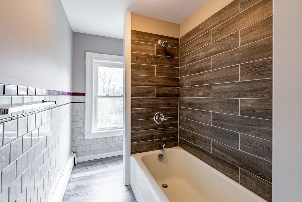37 North Street Three Rivers, MA 01080 - Photo 13 of 35 a bathroom with a bathtub and a shower