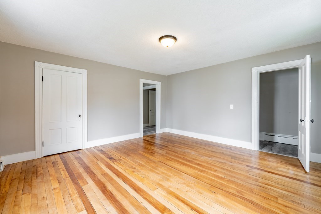 37 North Street Three Rivers, MA 01080 - Photo 26 of 35 a view of an empty room with wooden floor and closet