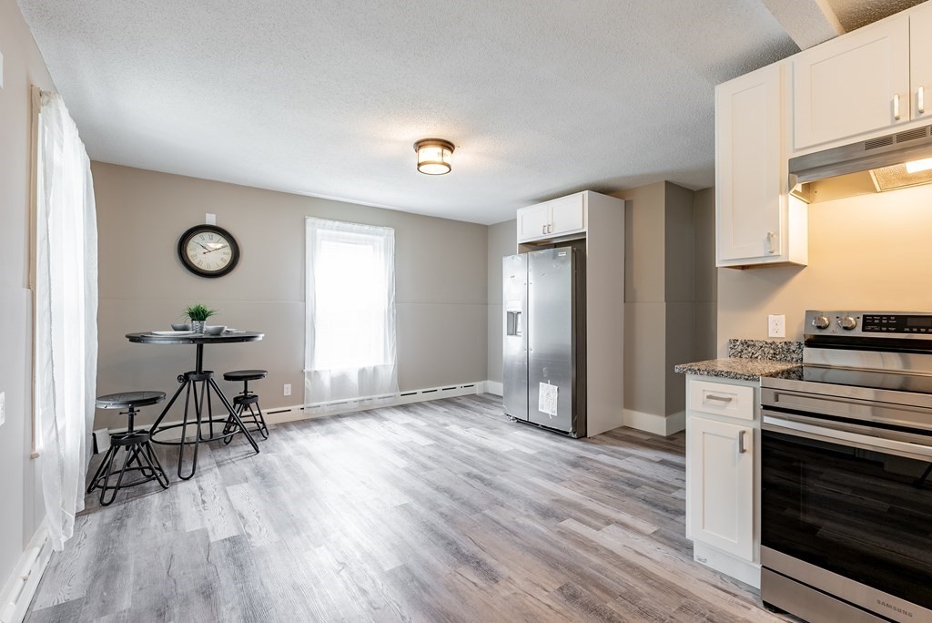 37 North Street Three Rivers, MA 01080 - Photo 3 of 35 a view of a kitchen with furniture wooden floor and window