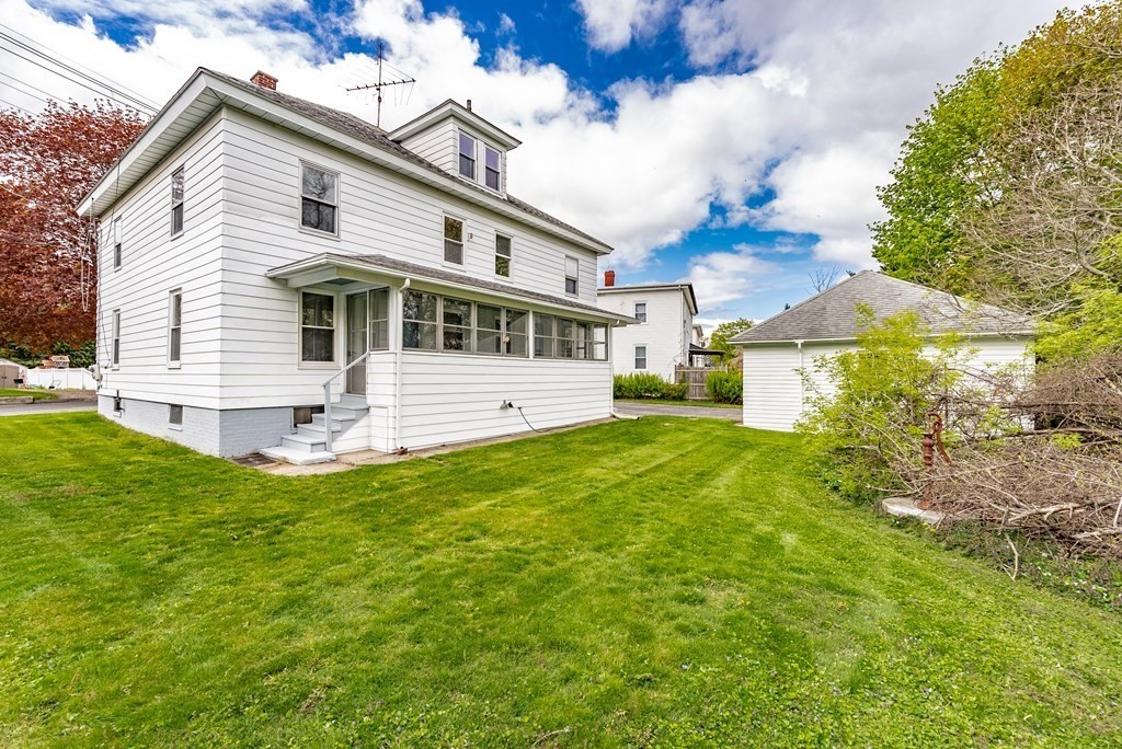 37 North Street Three Rivers, MA 01080 - Photo 31 of 35 a front view of a house with a garden and yard