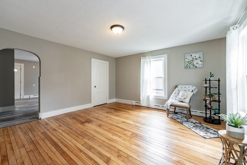37 North Street Three Rivers, MA 01080 - Photo 5 of 35 a bedroom with a bed and wooden floor