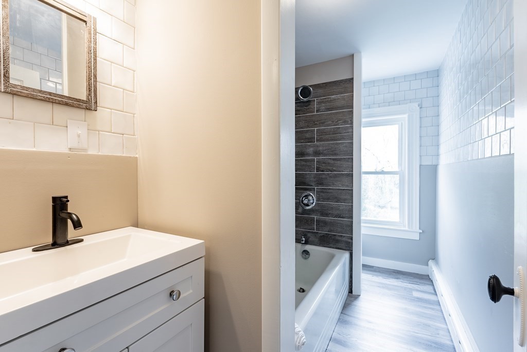 37 North Street Three Rivers, MA 01080 - Photo 8 of 35 a bathroom with a bathtub and shower