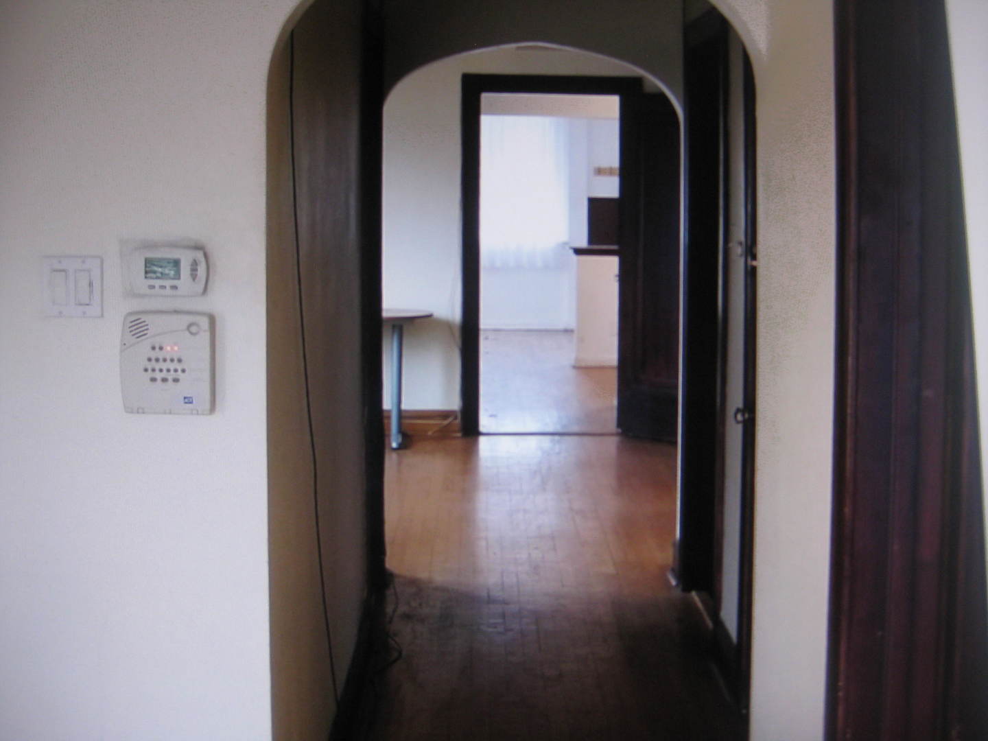 2906 North Pulaski Road Chicago, IL 60641 - Photo 8 of 9 a view of a hallway with wooden floor