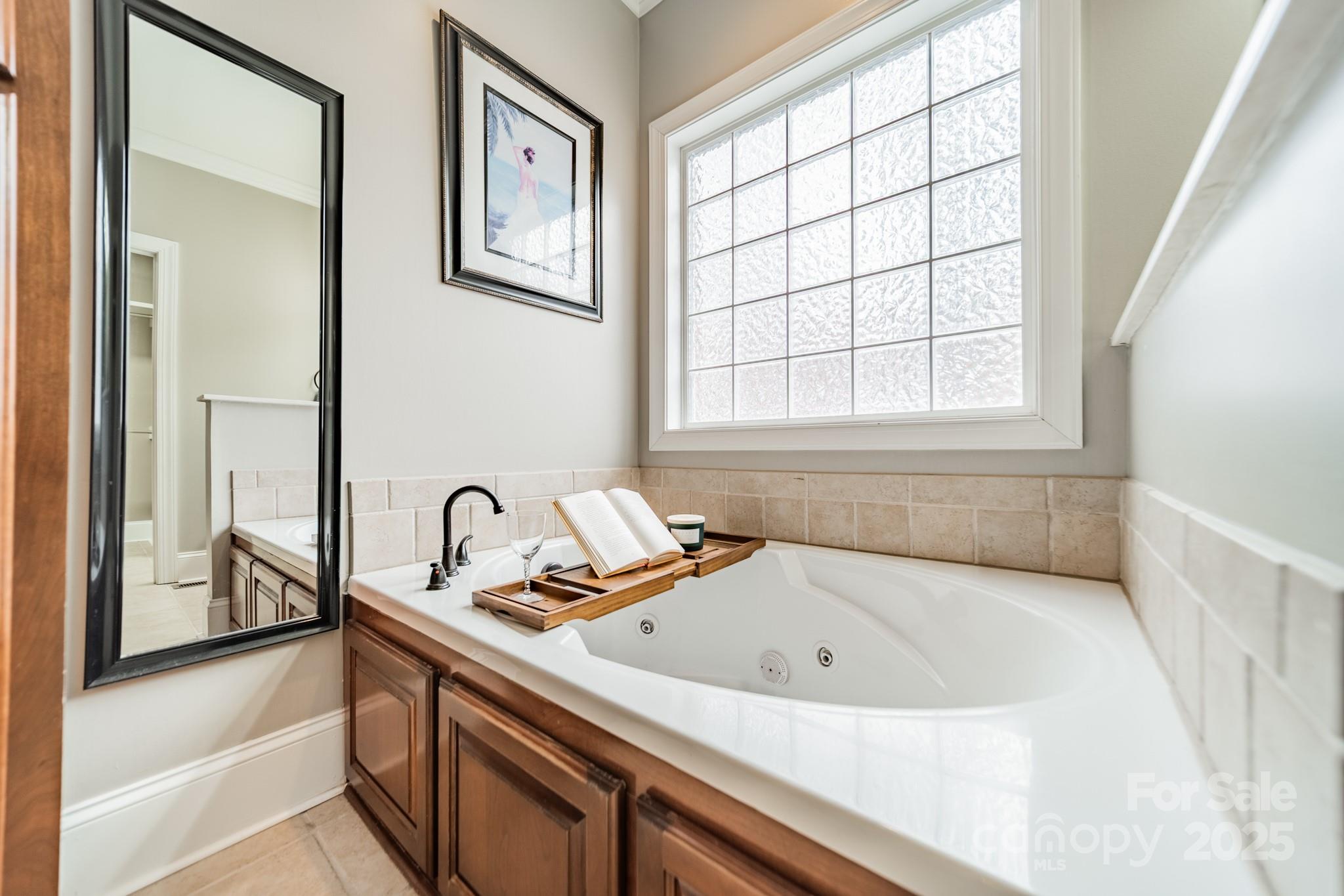 5201 Barrier Store Road Mount Pleasant, NC 28124 - Photo 18 of 46 a bath tub sitting next to a window