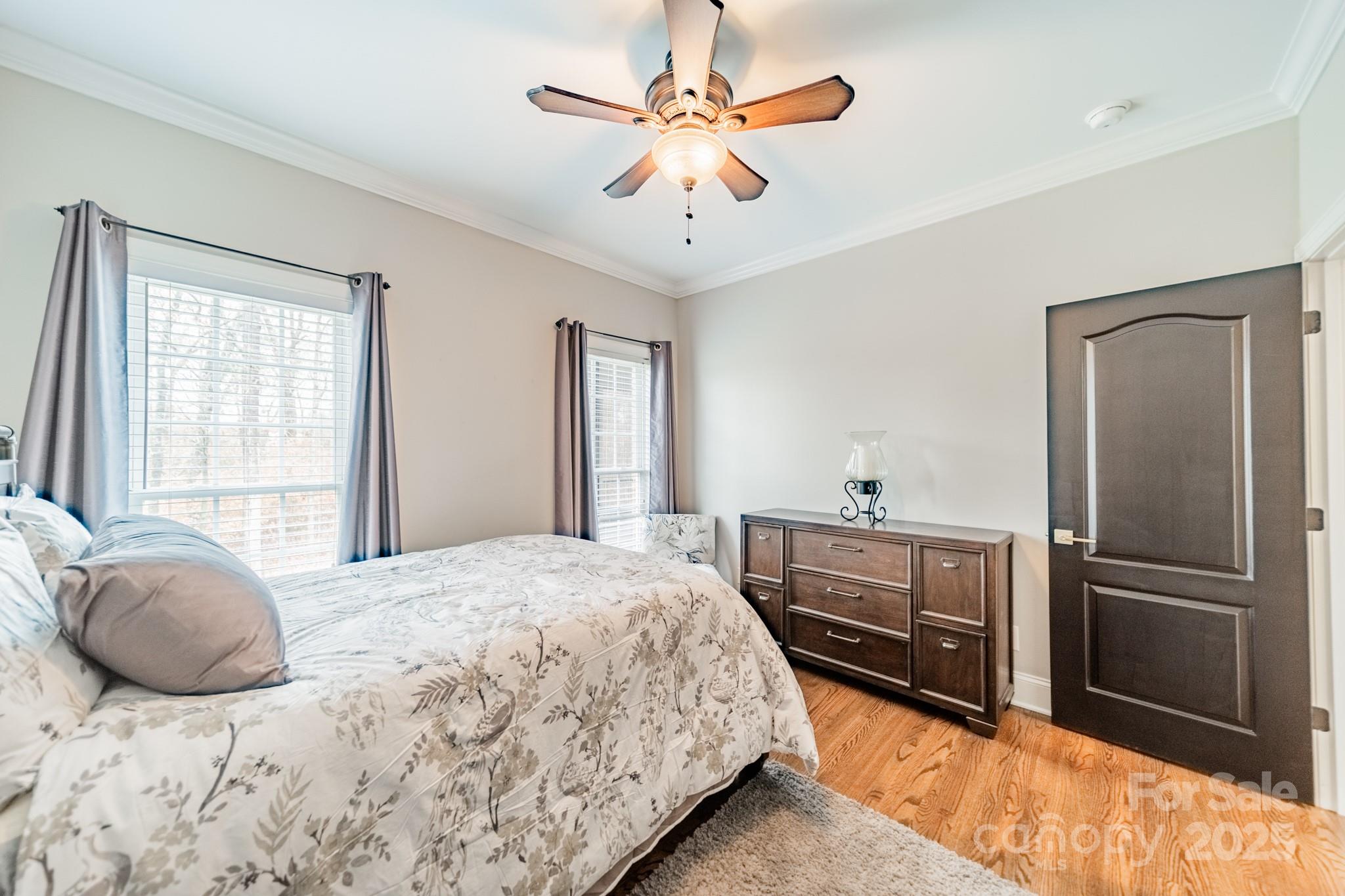 5201 Barrier Store Road Mount Pleasant, NC 28124 - Photo 25 of 46 a bedroom with a bed and a refrigerator