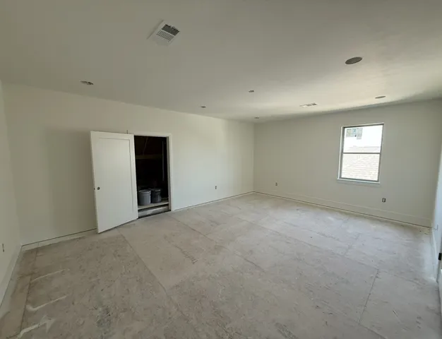 an empty room with windows