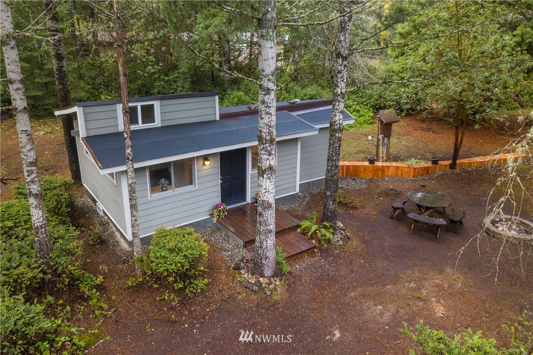 26 Webb Road Southwest Lakebay, WA 98349 - Photo 1 of 31 front view of a house with a yard