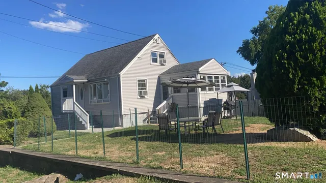 a front view of a house with a porch