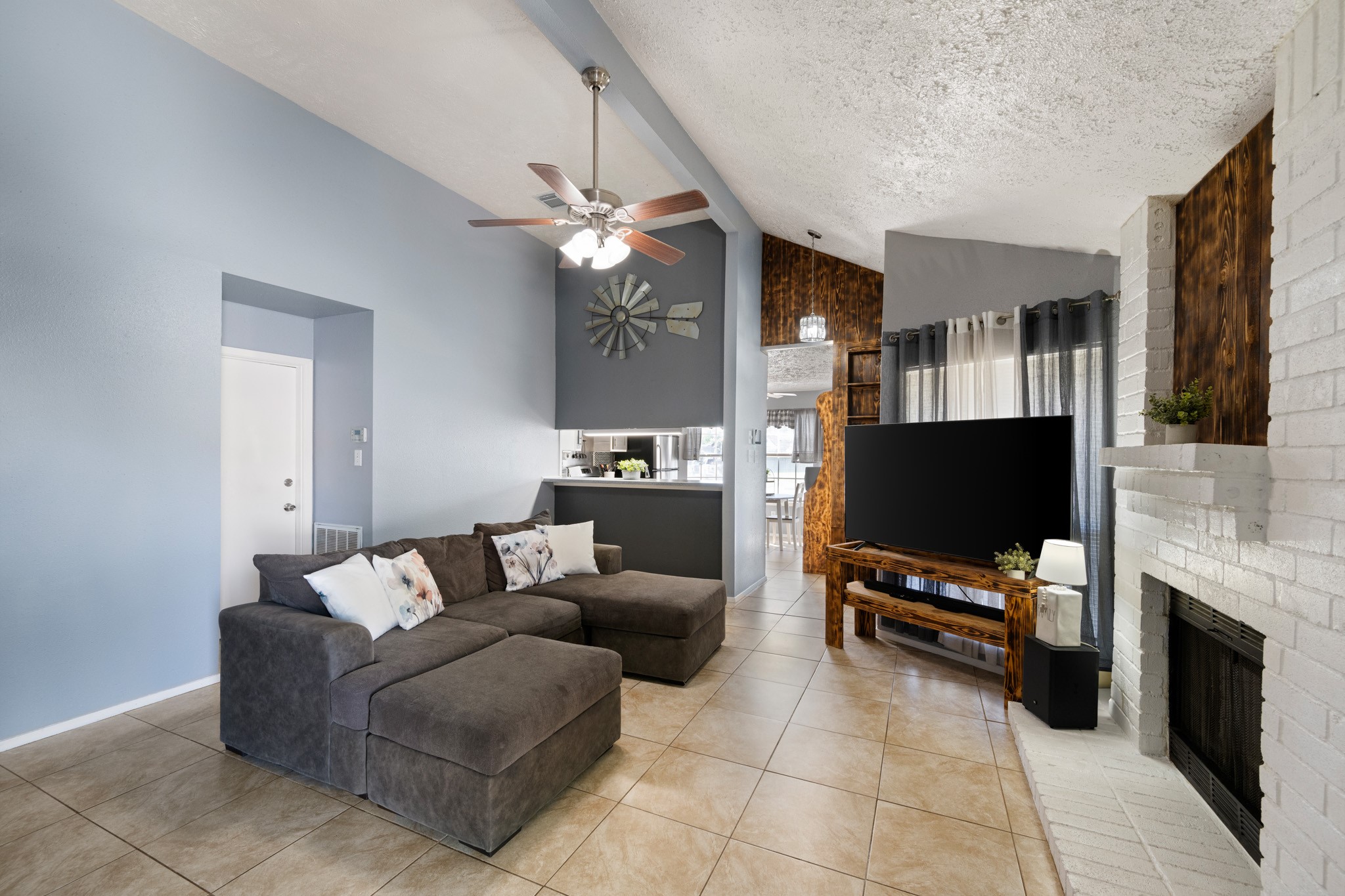 1804 Spruce Drive Rosenberg, TX 77471 - Photo 6 of 29 a living room with furniture and a flat screen tv