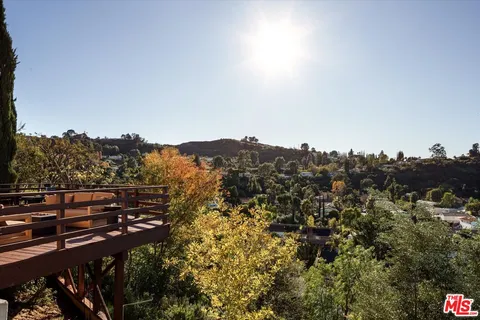 a kitchen with a cabinets and appliances